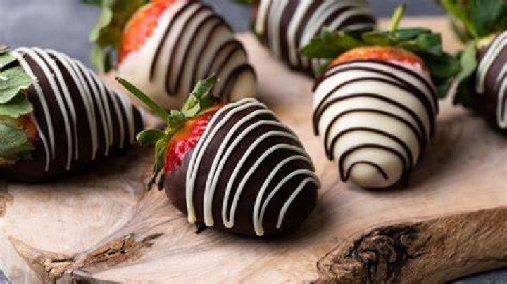 Chocolate Covered Pretzels are fast, easy and delicious! A perfect sweet and salty treat that's perfect for parties, holidays or any special occasion. White and Dark chocolate covered pretzels.